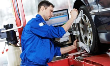 Automobile care through coupons for wheel alignment by Firestone
