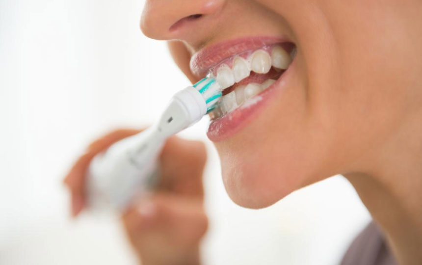 Teeth cleaning guide with Oral B electric toothbrush