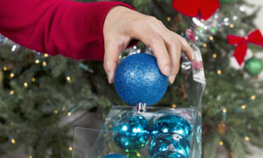 Tips for deciding if a Santa tree topper is right for your tree