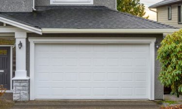 Vinyl and wooden garage door choices for modern houses