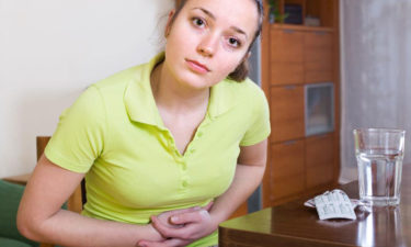 What are the symptoms of chronic constipation?
